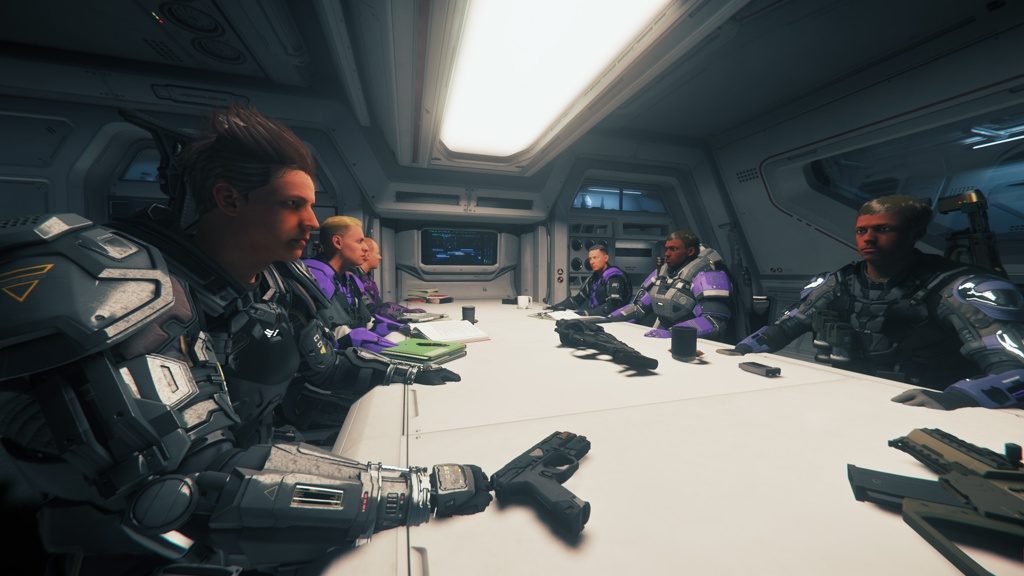 Membres Disorder en armure violette lors d'un briefing tactique dans Star Citizen